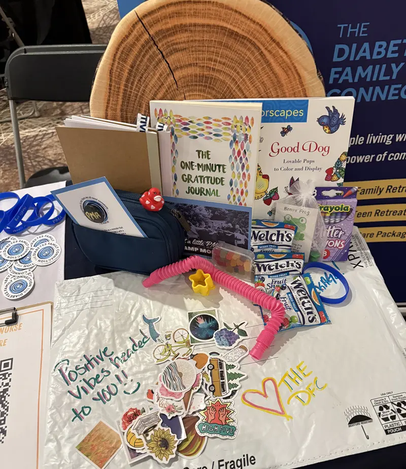 A PMA Care Package with contents spread out and handwritten letter visible