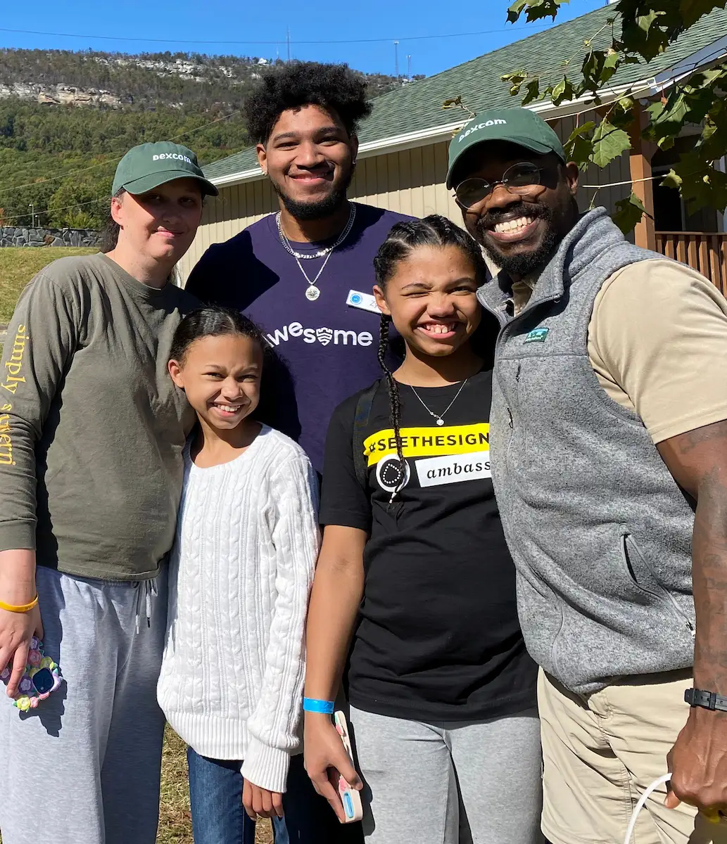 Chris and his family volunteering with The DFC